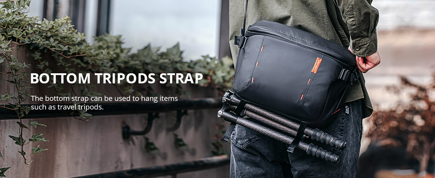 The bottom strap of this large DSLR Camera Bag can be used to hang items such as travel tripods