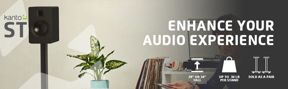 Kanto ST speaker stands with speakers in room next to record player and woman